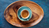 espresso shot on wood plate