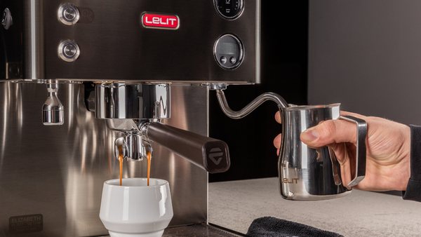 lelit espresso machine pulling a shot of espresso and steaming milk
