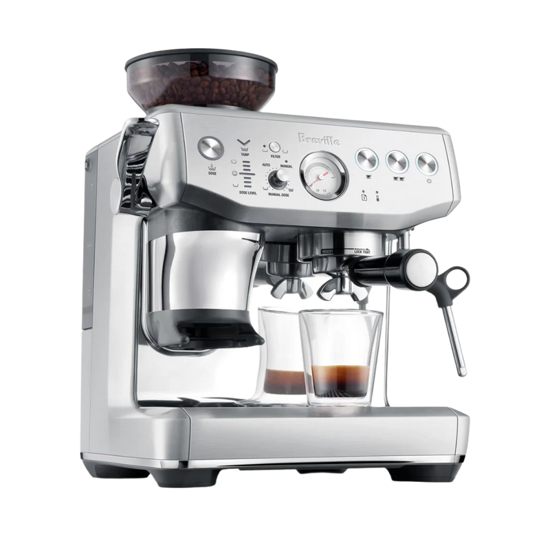 Breville Barista Express Impress espresso machine in stainless steel with portafilter and cup