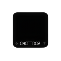 Pitch Black: Acaia Pearl coffee scale in Pitch Black with LED display lit