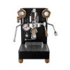 Lelit Mara X3 black espresso machine, front view with Pagaia flow control lever and wood knobs
