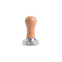 Mahlkönig coffee tamp with wooden handle on a white background
