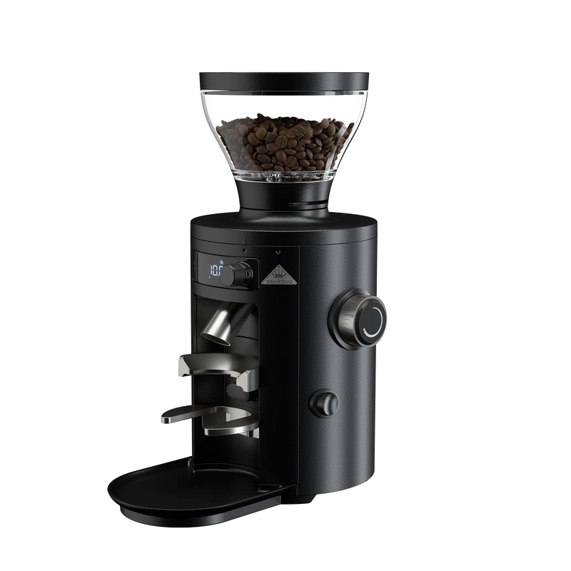 Mahlkönig X54 Allround home coffee grinder in black with beans in the hopper, angled view