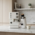 Turin Legato Espresso Machine Next to a Turin DF54 Grinder in a Modern Kitchen