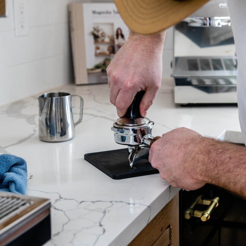 ascaso steel duo espresso machine white tamping view