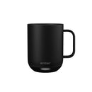Black mug with 'ember' branding on a white background
