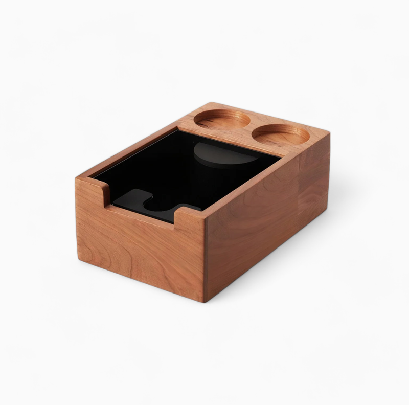 Wooden tamping station with two round compartments on a white background