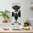 eureka oro mignon xl chrome coffee grinder in kitchen
